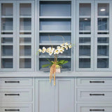 Ten matte black zinc alloy oval bar cabinet pulls with 10-inch center-to-center spacing arranged on a white surface - view 5