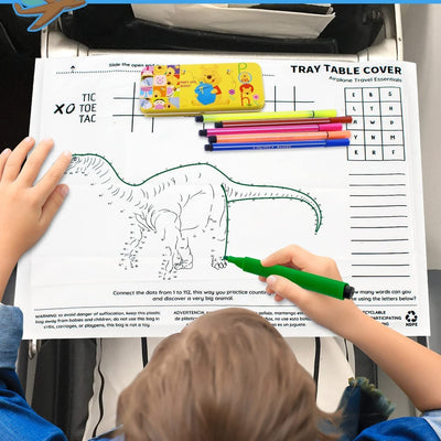 Pack of 20 ElocioFun dinosaur airplane tray table covers laid flat showing coloring game and activity designs, 18x14 inches