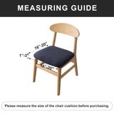 Four navy blue jacquard stretch dining chair seat covers with anti-slip straps laid flat and fitted on chairs - view 3