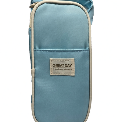Light blue fabric multi-compartment zipper pencil case pouch with cream trim, top carry handle, and front slip pocket