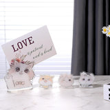MALACHI clear acrylic cat-shaped memo and photo clip holder stand on a desk, 2x2x2 inches, multicolor print