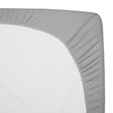 Three folded gray star and zigzag print fitted mini crib sheets 24x38 inch by American Baby Company in packaging - view 8