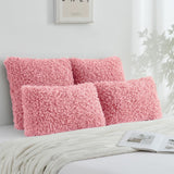 Two pink faux wool boucle throw pillow covers 22x22 inches with gold heart charm zipper on a modern couch - view 6