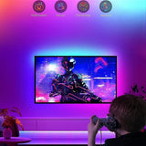 Govee H618C RGBIC 32.8ft LED strip lights displaying multiple colors simultaneously along a wall or room edge - view 6