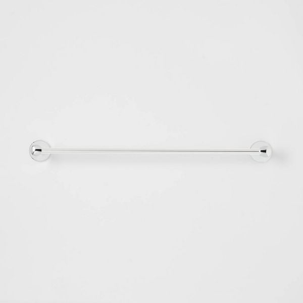 Threshold 24-inch polished chrome wall-mounted towel bar with curved design and concealed mounting hardware in bathroom