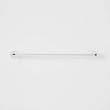 Threshold 24-inch polished chrome wall-mounted towel bar with curved design and concealed mounting hardware in bathroom