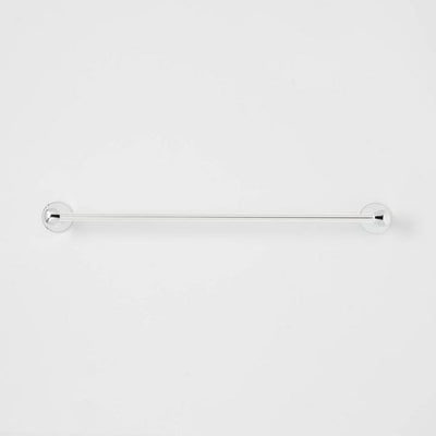 Threshold 24-inch polished chrome wall-mounted towel bar with curved design and concealed mounting hardware in bathroom