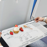 Pack of 20 ElocioFun dinosaur airplane tray table covers laid flat showing coloring game and activity designs, 18x14 inches - view 2