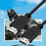 Black male-to-male HDMI cable coiled on white background compatible with TV laptop projector and PC - view 3