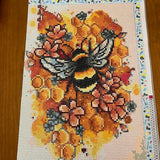 Two 5D diamond painting kits with butterfly and honeybee designs on 12x16 inch canvases with round full drill resin diamonds - view 2