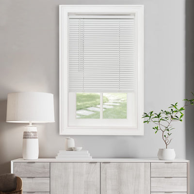 Achim Pearl White cordless vinyl mini blind with 1-inch slats mounted on window, 37x64 inches, light filtering