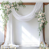 White sheer chiffon fabric panel draped over a wedding arch, 29 inches wide by 19 feet long, lightweight and flowing