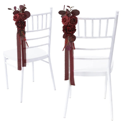 Two red artificial rose pew decorations with flowing chiffon ribbons for wedding aisle chair backs, new in box
