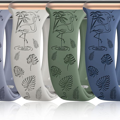 Four engraved silicone Apple Watch bands in blue, cream white, army green, and muted blue with flamingo pattern