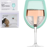 Seafoam silicone wine glass holder mounted on glossy shower tile using patented grip technology, no suction cups