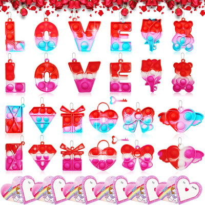 24 multicolor heart-shaped silicone pop fidget keychains each paired with a Valentine's Day greeting card