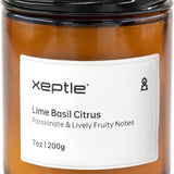 Xeptle 7oz lime basil citrus scented soy wax candle in black glass jar with ribbon accent, odor eliminating