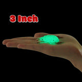 24 glow-in-the-dark rubber bug toys with Valentine's Day cards arranged on a surface, fluorescent green bugs by Axbotoy - view 3