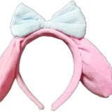 Pink Kuromi kawaii plush ear headband with soft fabric ears, shown as cosplay costume hairband accessory