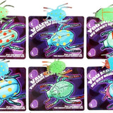 24 glow-in-the-dark rubber bug toys with Valentine's Day cards arranged on a surface, fluorescent green bugs by Axbotoy - view 2